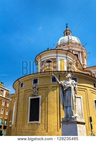 Statue of San Carlo and the Basilica in Rome, Italy