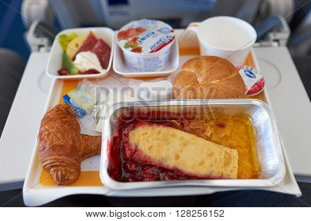FRANKFURT, GERMANY - APRIL 07, 2016: meal at Lufthansa Airbus A320 economy class.  Deutsche Lufthansa AG, commonly known as Lufthansa is a major German airline.