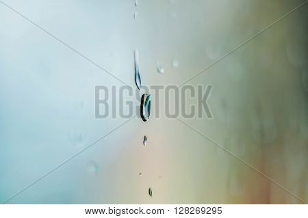 crystal water drops on window after rain