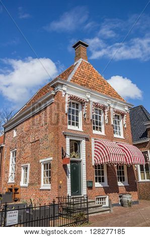 APPINGEDAM, NETHERLANDS - APRIL 16, 2016: Old house in the center of Appingedam, Netherlands