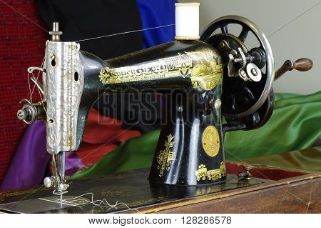 Kozmice Male, Poland, April 30, 2016. Private sewing workshop. Singer sewing machine, serial number Y-5.203.193. Manufactured in 1927 by Singer factory in Clydebank, Scotland.