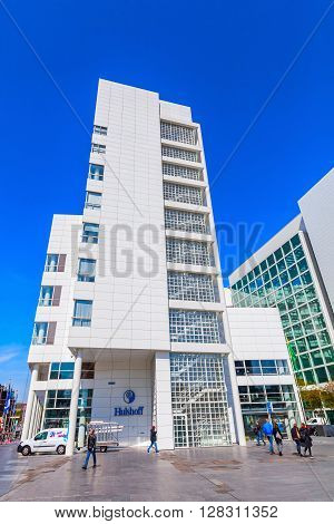 The Hague Netherlands - April 21 2016: New City Hall of The Hague with unidentified people. It was designed in 1986 by American architect Richard Meier and completed in 1995