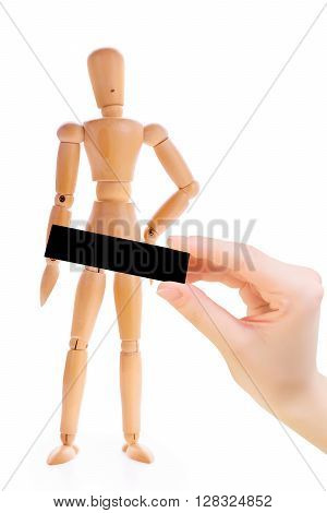 Wooden man with a hand holding a black rectangle. Concept of censorship and parental control. Isolated on white