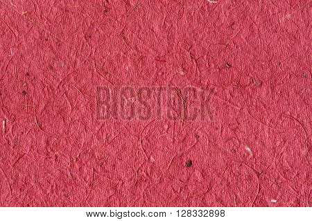 Red background - texture of decorative colored paper