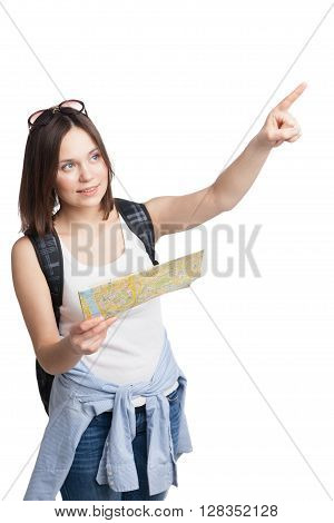 young pretty girl in looking for place on  map with rucksack over white background