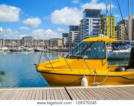 The moored yachts and luxury houses in harbor. Sovereign Harbour Marina Eastbourne East Sussex England