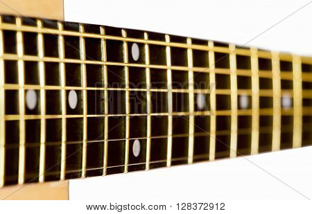 Grif of an acoustic guitar close up on a white background
