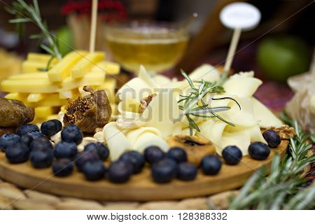 Still life photo with Georgian cheese apple grape etc