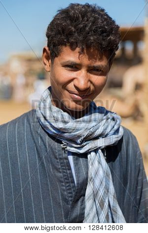 DARAW, EGYPT - FEBRUARY 6, 2016: Portrait of local boy at Camel market.