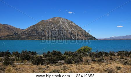 Turquoise Lake Ohau. Ben Ohau Range. Travel destination in New Zealand.
