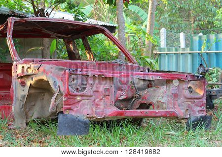 Old Car Wreck in the garden .