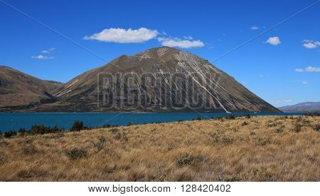 Mountain range in New Zealand. Lake Ohau.