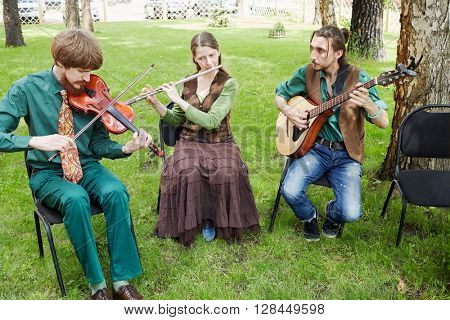 MOSCOW, RUSSIA - MAY 30, 2015: Musical Band Polca an Ri plays music in forest on summer day.