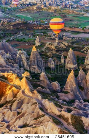 Balloon silhouette in the sunrise sky. Cappadocia, Turkey