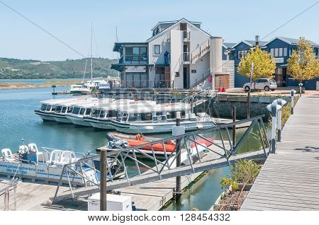KNYSNA SOUTH AFRICA - MARCH 3 2016: The Harbor Town on the historic Thesens Island. Several types of boats including houseboats are visible
