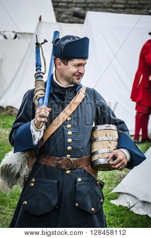 NARVA, ESTONIA - AUGUST 10: Historical reconstruction in Narva Castle on August 10, 2013, Estonia. Historical reconstruction of the Battle of Narva in the Swedish Russian war years 1700-1704