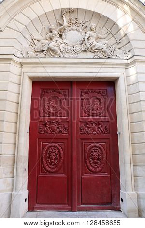 Old door in the city of Paris