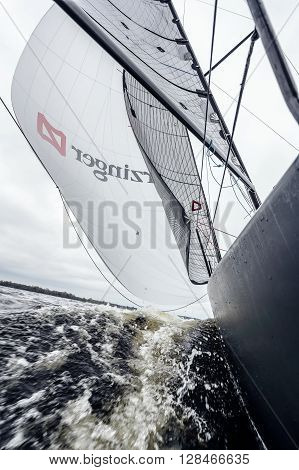 KYIV, UKRAINE - APRIL 26, 2016: Traning on the new model of yacht OceanTECH L30 on the Kyiv water reservoir or Kyiv SEA with Rodion Luka, L30 idea author, Silver Olympic medalist.