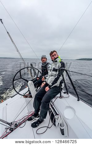 KYIV, UKRAINE - APRIL 26, 2016: Traning on the new model of yacht OceanTECH L30 on the Kyiv water reservoir or Kyiv SEA with Rodion Luka, L30 idea author, Silver Olympic medalist.