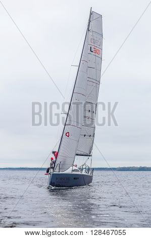 KYIV, UKRAINE - APRIL 26, 2016: Traning on the new model of yacht OceanTECH L30 on the Kyiv water reservoir or Kyiv SEA with Rodion Luka, L30 idea author, Silver Olympic medalist.