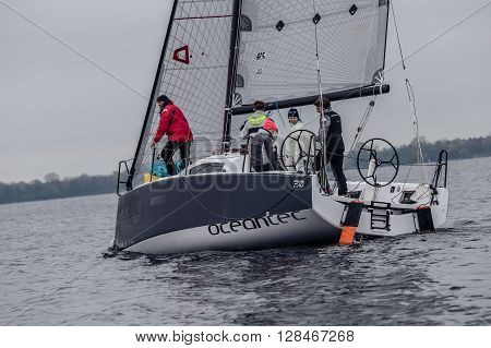 KYIV, UKRAINE - APRIL 26, 2016: Traning on the new model of yacht OceanTECH L30 on the Kyiv water reservoir or Kyiv SEA with Rodion Luka, L30 idea author, Silver Olympic medalist.