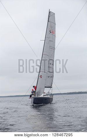KYIV, UKRAINE - APRIL 26, 2016: Traning on the new model of yacht OceanTECH L30 on the Kyiv water reservoir or Kyiv SEA with Rodion Luka, L30 idea author, Silver Olympic medalist.