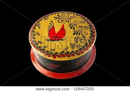 Russian wooden casket in Mezen painting isolated on black