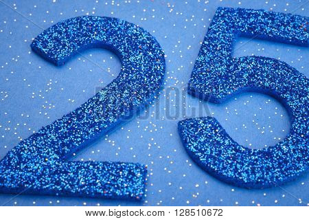 Number twentyfive blue color over a blue background. Anniversary. Horizontal