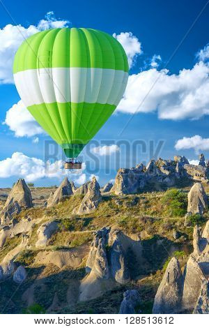 Balloon silhouette in the sunrise sky. Cappadocia, Turkey