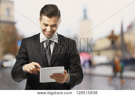 Young urban man using tablet-pc