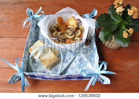 roast potatoes with mushrooms, cooked food with potatoes.