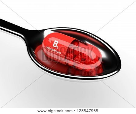 3D Vitamin B2 Pill On Spoon Over White