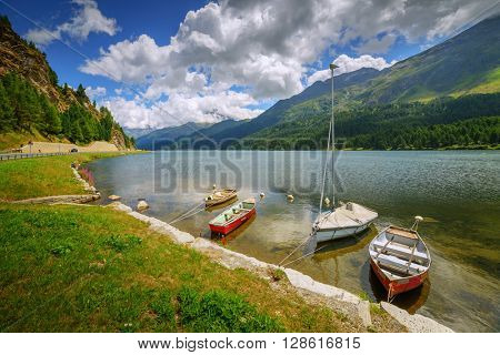 Amazing sunny day at Champferersee lake in the Swiss Alps. Silvaplana village, Switzerland, Europe.