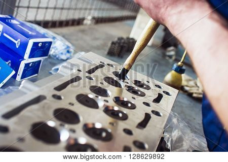 Hands Repairing A Car Engine With A Wrench