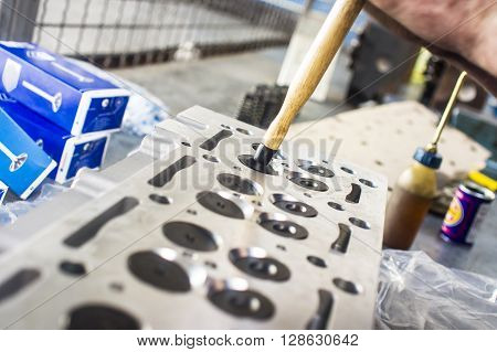 Hands Repairing A Car Engine With A Wrench