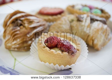 assortment of pastries with cream or chocolate or also with fresh fruit