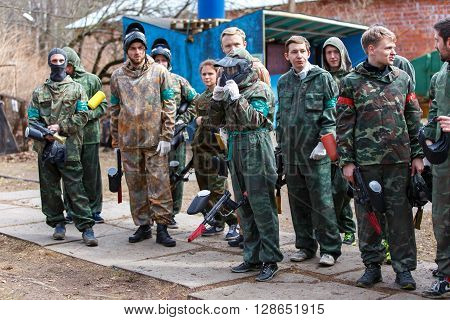 Saint-Petersburg, Russia - April 24, 2016: Paintball tournament in Snaker club between student teams from five universities. Group photo.