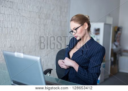 Blonde businesswoman in glasses lust online flirt