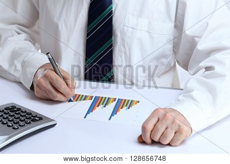 office worker is writing on a document