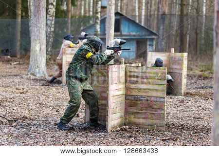 Saint-Petersburg, Russia - April 24, 2016: Paintball tournament in Snaker club between student teams from five universities. Game process.