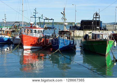fishing boats in the bay at cobh county cork ireland