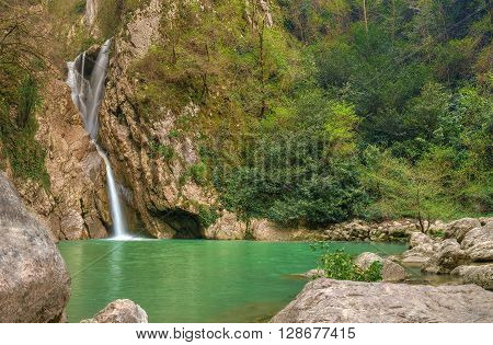 Waterfall on the Agura River in Sochi Krasnodar Krai Russia. HDR processing