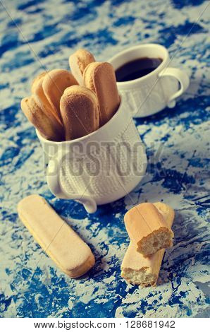 Homemade traditional italian cookie savoiardi. Selective focus
