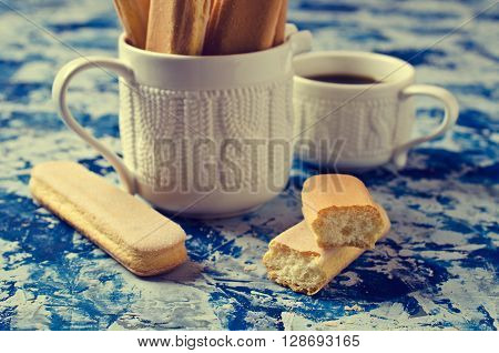 Homemade traditional italian cookie savoiardi. Selective focus