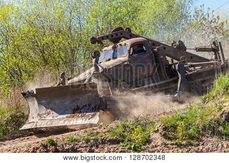 GRIMMEN/ GERMANY - MAY 1: soviet BAT - M military bulldozer drives on track on a motortechnic festival on may 1 2016 in grimmen / Germany.