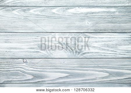 White and grey brushed wooden planks closeup.