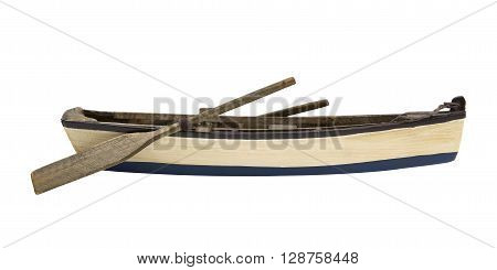 Isolated wooden boat with paddles over white