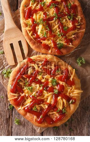 langos With Cheese And Ketchup Close-up. Vertical Top View