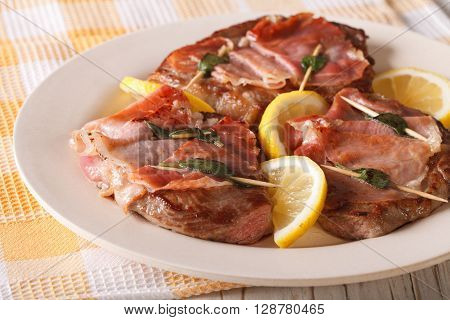 Beef Saltimbocca With Sage And Ham Close-up. Horizontal
