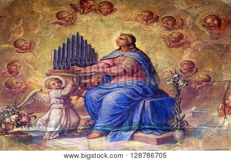 ZAGREB, CROATIA - SEPTEMBER 14: Saint Cecilia, fresco in the Basilica of the Sacred Heart of Jesus in Zagreb, Croatia on September 14, 2015.